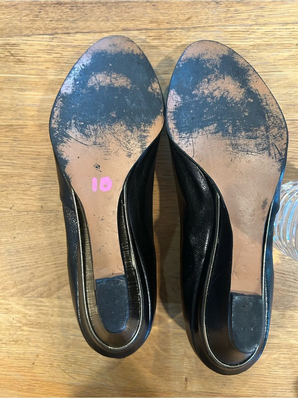 Black Leather Pointed-Toe Wedge Pumps